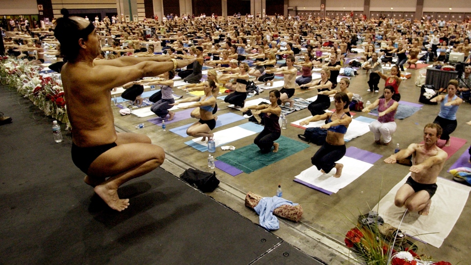 Bikram yoga founder ordered to give up income to pay for lawsuit