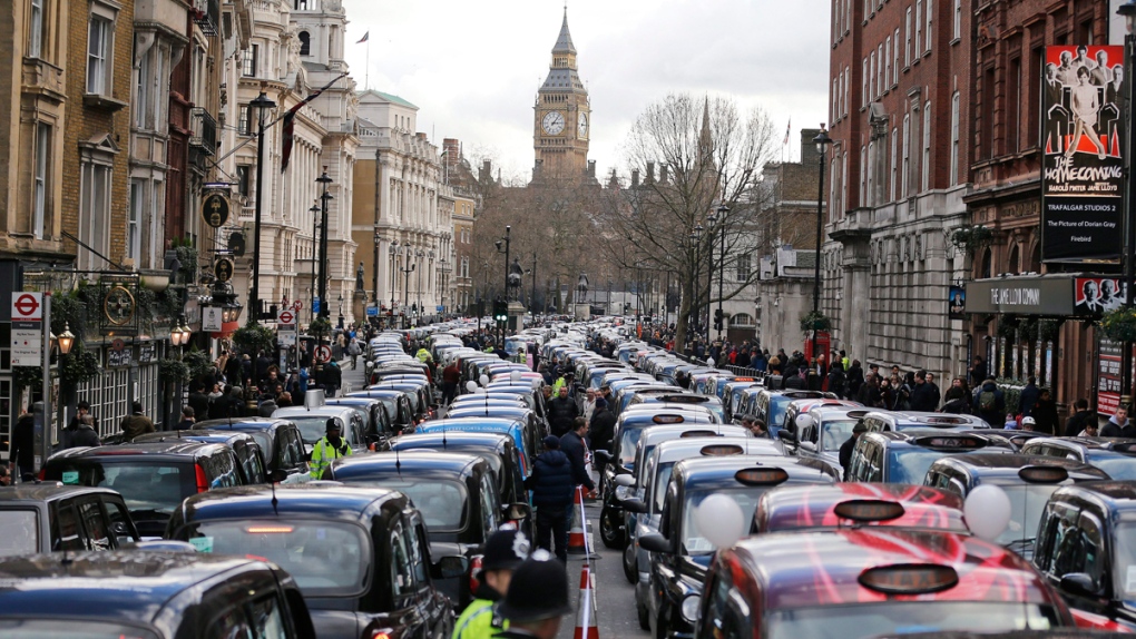 London taxis block roads in protest
