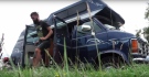 Simon Stiles lives in his 1992 Dodge Ram, which features a kitchen, bed, table and solar power. (Finding Simon / YouTube) 