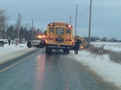 A school bus that slid into a ditch in Halton Hills on Friday morning is shown. (Halton Regional Police)