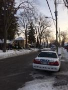 Police tape surrounds a home on Duchess Avenue where a man died following a confrontation with police early on Friday, Dec. 23, 2016.