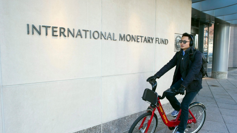 The International Monetary Fund (IMF) headquarters is seen Monday, Dec. 19, 2016, in Washington. (AP Photo/Cliff Owen)