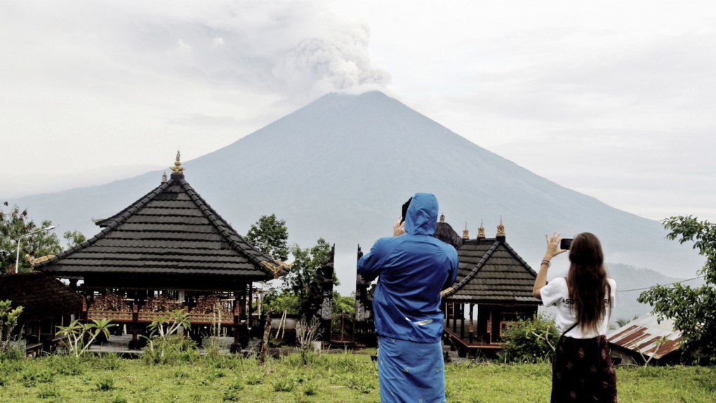 Bali volcano continues spewing ash