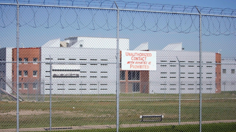 A sign marks the perimeter of the Regina Correctional Centre on Monday Aug. 25, 2008. THE CANADIAN PRESS/Troy Fleece