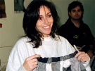 Heidi Fleiss, holds a pair of shorts from her clothing line, named Heidi Wear, in Los Angeles, Calif., in this Dec. 3, 1994 file photo. (AP Photo/Michael Tweed, File)