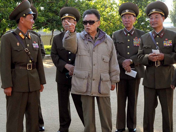 In this undated photo released by Korean Central News Agency via Korea News Service in Tokyo Sunday, June 14, 2009, North Korean leader Kim Jong Il, center, inspects an army command centre in North Korea. (AP / Korean Central News Agency via Korea News Service)