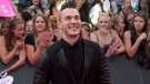 Shawn Desman poses on the red carpet during the 2013 Much Music Video Awards in Toronto on Sunday June 16, 2013. THE CANADIAN PRESS/Nathan Denette