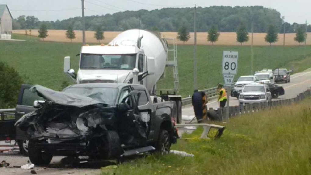 Two vehicle collision involving a cement truck