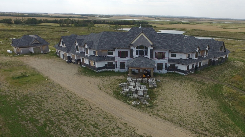 The unfinished 12,000 square foot mansion is near the hamlet of Weldon. (Courtesy: Ritchie Bros. Auctioneers.)