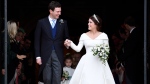 Princess Eugenie and Jack Brooksbank leave St George's Chapel after their wedding at Windsor Castle, near London, England, Friday Oct. 12, 2018. (Toby Melville, Pool via AP)