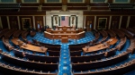 The chamber of the House of Representatives is seen before convening for the first day of the 116th Congress with Democrats holding the majority, at the Capitol in Washington, Thursday, Jan. 3, 2019. (AP Photo/J. Scott Applewhite)