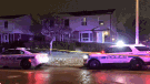 Peel Regional Police vehicles are shown outside a home where an 11-year-old girl that was the subject of an Amber Alert was found dead.