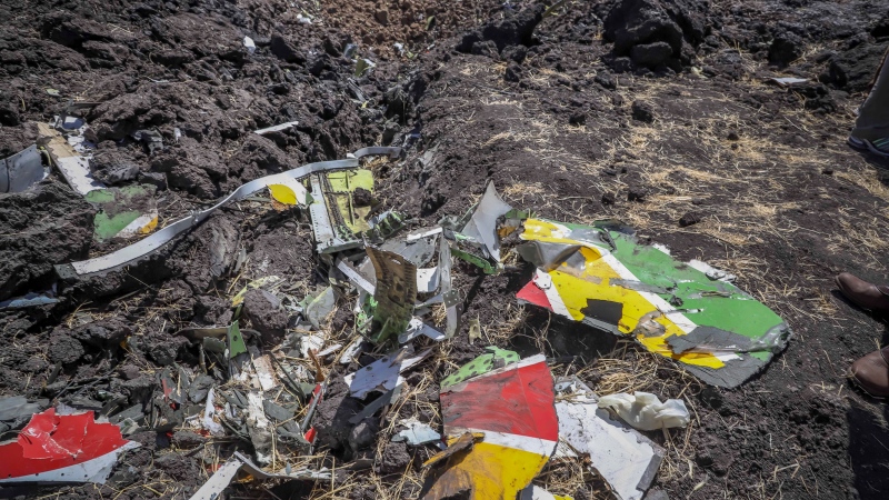 Wreckage lies at the scene of an Ethiopian Airlines flight that crashed shortly after takeoff at Hejere near Bishoftu, or Debre Zeit, some 50 kilometers (31 miles) south of Addis Ababa, in Ethiopia Sunday, March 10, 2019. (AP Photo)