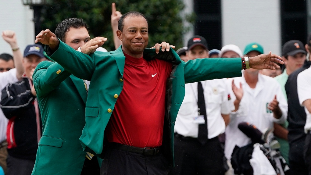 Green jacket, red mock turtleneck: Tiger's new attire a hit with golf fans  | CTV News