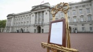 A notice placed on an easel in the forecourt of Buckingham Palace to formally announce the birth of a baby boy to Prince Harry and Meghan, the Duchess of Sussex, on May 6, 2019. (Yui Mok / Pool Photo via AP)