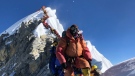 A queue of climbers on the Hillary Step of Mount Everest is shown in a May 22, 2019 handout photo. (THE CANADIAN PRESS/HO-Mark Ballard)