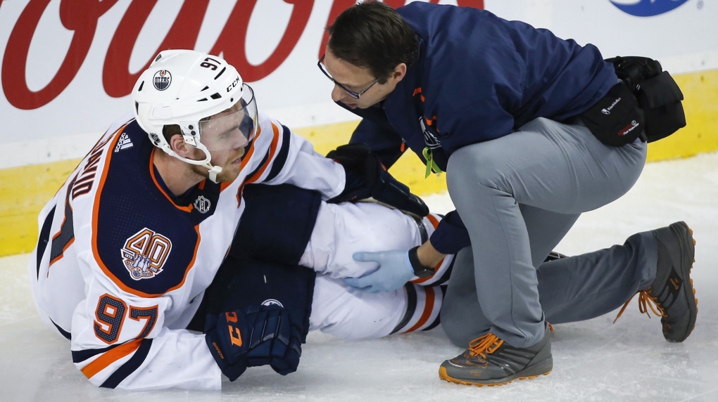 Sporting a brace, Oilers captain Connor McDavid mum on recovery from knee  injury | CTV News