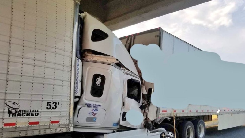 A truck crash on Highway 401 near Iona Road in Elgin County, Ont. on Friday, July 5, 2019. (@OPP_WR / Twitter)
