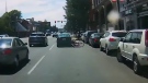 Police want to speak with a cyclist, seen here being struck by a car on Blanshard Street June 26. (Handout)