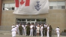 Officials gather outside the HMCS Prevost Naval Reserve in London, Ont. on Tuesday, Aug. 6, 2019. (Marek Sutherland / CTV London)