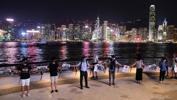 Hong Kong protesters form human chains to call for democracy | CTV News