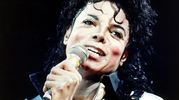 Michael Jackson performs during an open air concert in West Berlin on June 19, 1988. (AP / Elke Bruhn-Hoffmann)