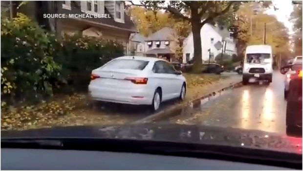 Video shows vehicle driving on sidewalk to avoid traffic in midtown ...