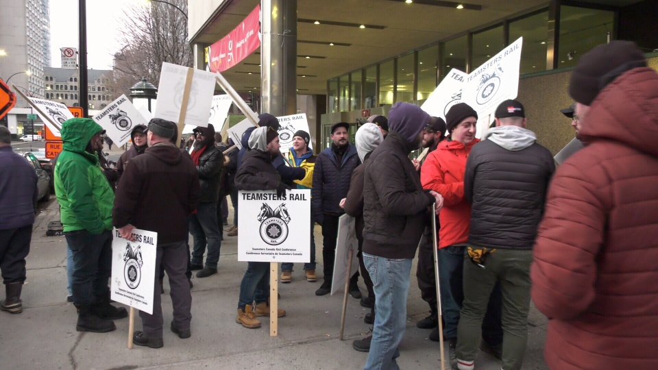 Union members picketing in front of CN headquarters in Montreal | CTV News