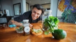 Pat Newton poses in front of his ingredients for a cannabis-infused dish. (sociophilo/Sandro Pehar)