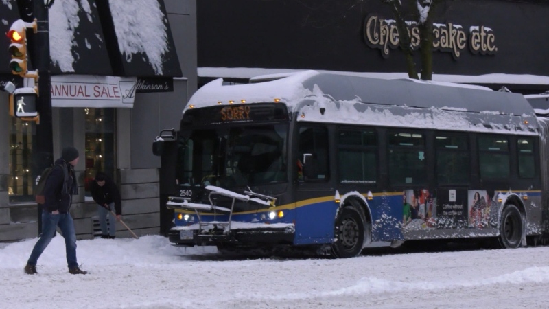 An out-of-service bus in the snow in downtown Vancouver on Wednesday, Jan. 15, 2020.