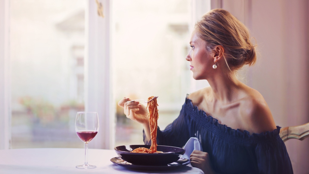 Woman and spaghetti