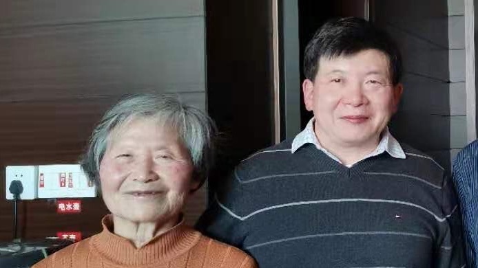 Kai Huang and his mother had been in Wuhan, China to sell a family-owned apartment.