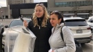 Andrea Chelchowski  and her mother-in-law Paula Domingues after receiving a wedding veil in downtown London Ont. on March 14, 2020. (Jordyn Read/CTV)