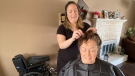 Amanda Cooke is getting her hair cut byt Isabelle Paquette, helping her in a time of need. Embrun, ON. March 16, 2020. (Tyler Fleming / CTV News Ottawa)