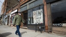 A closed store front boutique business called Francis Watson pleads for help displaying a sign in Toronto on Thursday, April 16, 2020. Prime Minister Justin Trudeau is expected to announce today significant rent relief to help businesses that can't afford to pay their landlords at a time when their operations are shut down due to the COVID-19 pandemic. THE CANADIAN PRESS/Nathan Denette