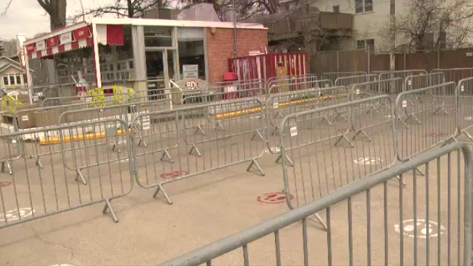 Bridge Drive-In is using fencing and stencilled footprints to create a physically distanced lineup. (Source: CTV News/Gary Robson)