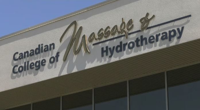 A sign for the Canadian College of Massage and Hydrotherapy in Cambridge.