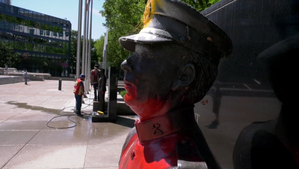 statues, red paint, memorial, police, firefighter,