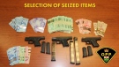 Cash and guns seized during a weapons investigation on the Chippewas of the Thames First Nation on July 26, 2020. (Supplied)