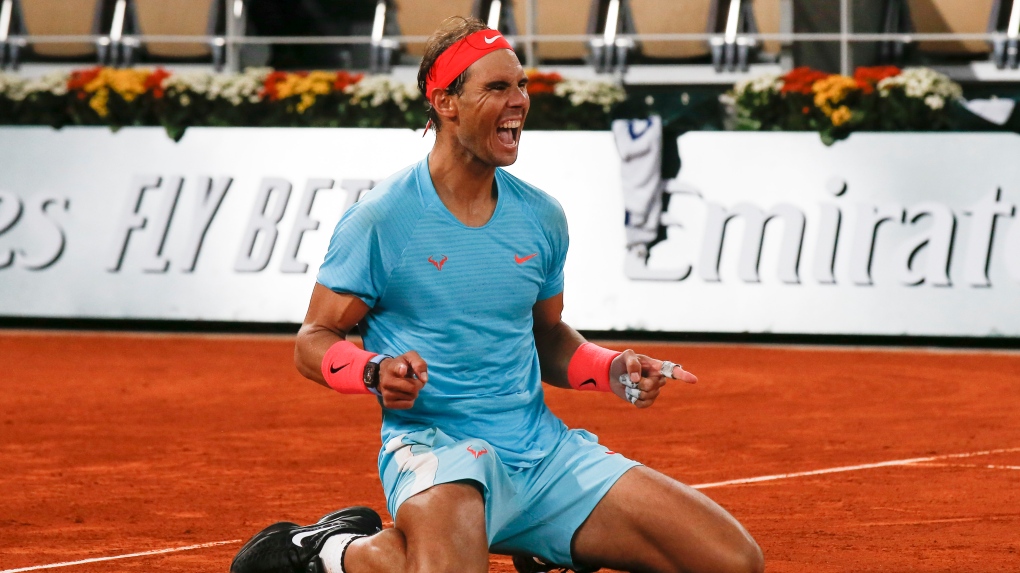 Perfect in Paris, Nadal overwhelms Djokovic to tie Federer | CTV News