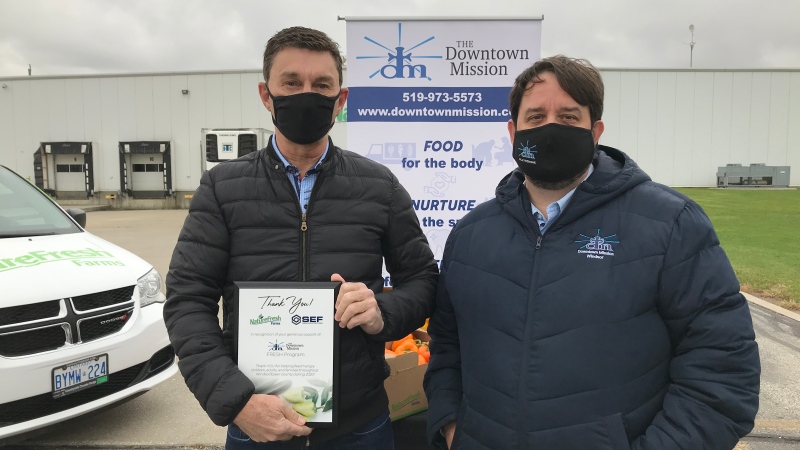 Peter Quiring, of Nature Fresh Farms, was given a Recognition Award from the Downtown Mission's Ron Dunn in Windsor, Ont. on Monday, Oct. 26 2020.