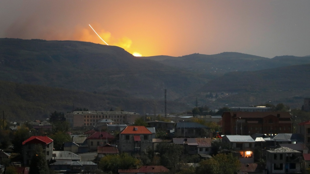Explosions behind mountains outside Stepanakert