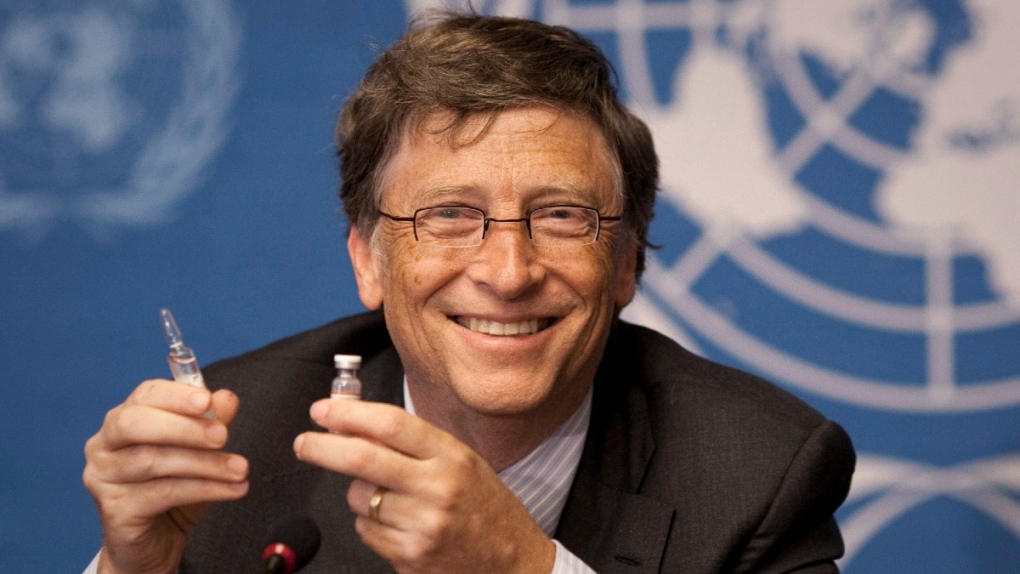 Bill Gates holds a vaccine at the UN in 2011