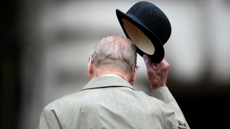 In this Wednesday Aug. 2, 2017 file photo, Prince Philip, in his role as Captain General of the Royal Marines, attends a parade on the forecourt of Buckingham Palace, in central London. Hannah McKay/Pool via AP, File