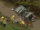 Crews had to use the Jaws of Life to extract two occupants of a Porsche Cayenne that crashed into a ditch in Richmond, B.C., Monday afternoon. Nov. 9, 2009. 