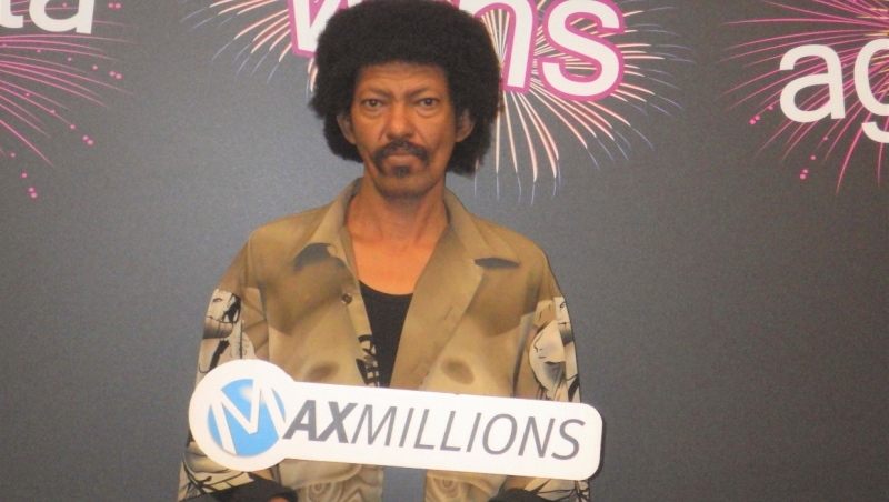 Osman Adam said he couldn't believe his eyes when he scanned his Lotto Max ticket and discovered he had won. (Western Canada Lottery Corporation)