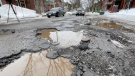Potholes along MacLaren Street in Centretown on Friday, March 11, 2022. (Peter Szperling/CTV News Ottawa)