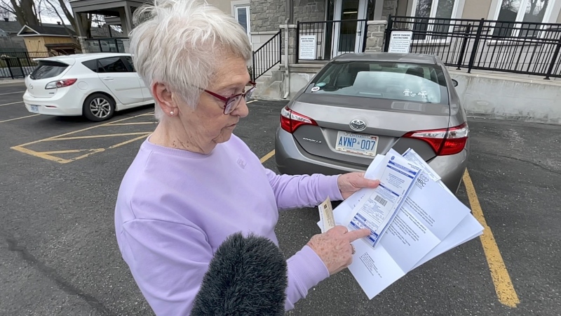 Gail Salmon showing her Quebec ticket that cost her nearly $500 for expired plates. (Dave Charbonneau/CTV News Ottawa)