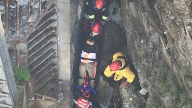 Crews Rescue Man After Falling From Embankment | CTV News