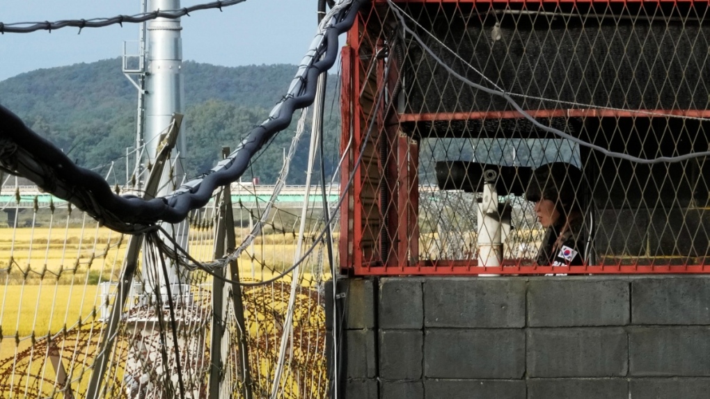 South Korean soldier stands guard at the border